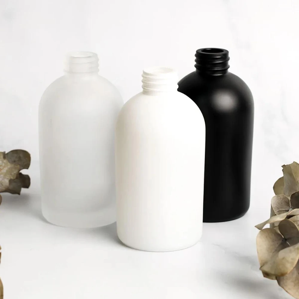 Boston round plastic bottles