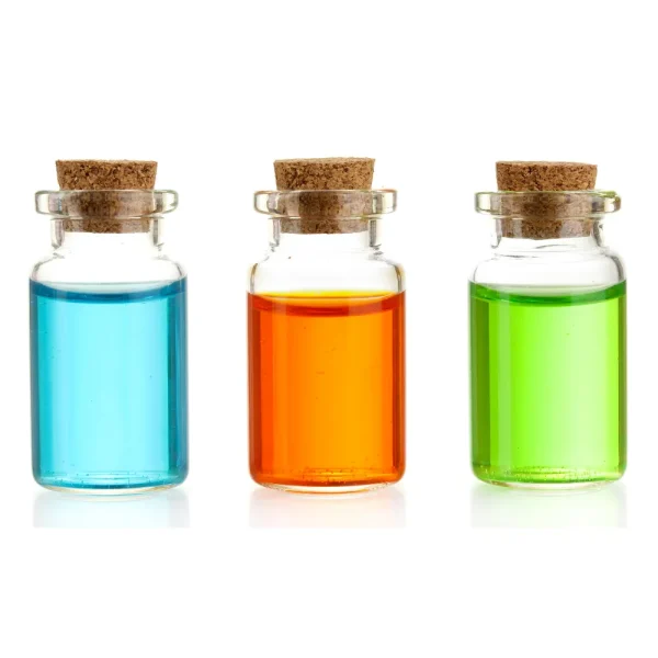 small glass jars with cork lids